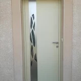Porte entrée ajourée